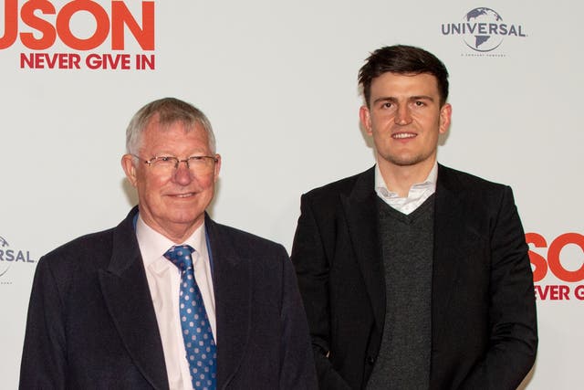 Manchester United captain Harry Maguire with former club coach Sir Alex Ferguson this week