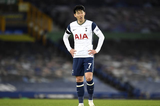 Tottenham forward Son Heung-min stands dejected