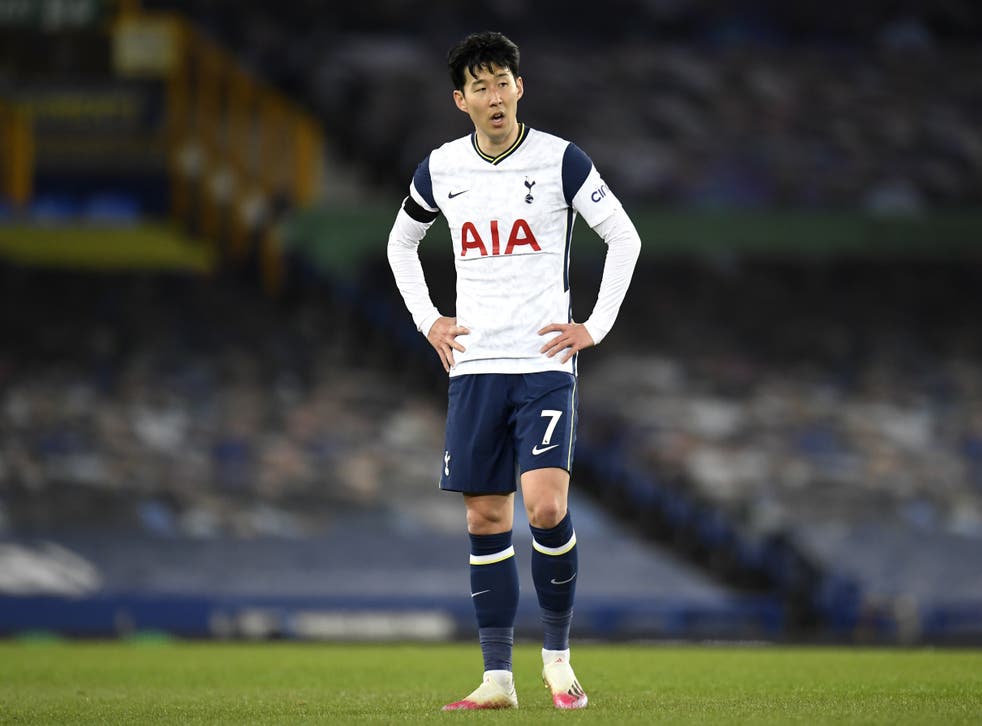 Tottenham forward Son Heung-min stands dejected
