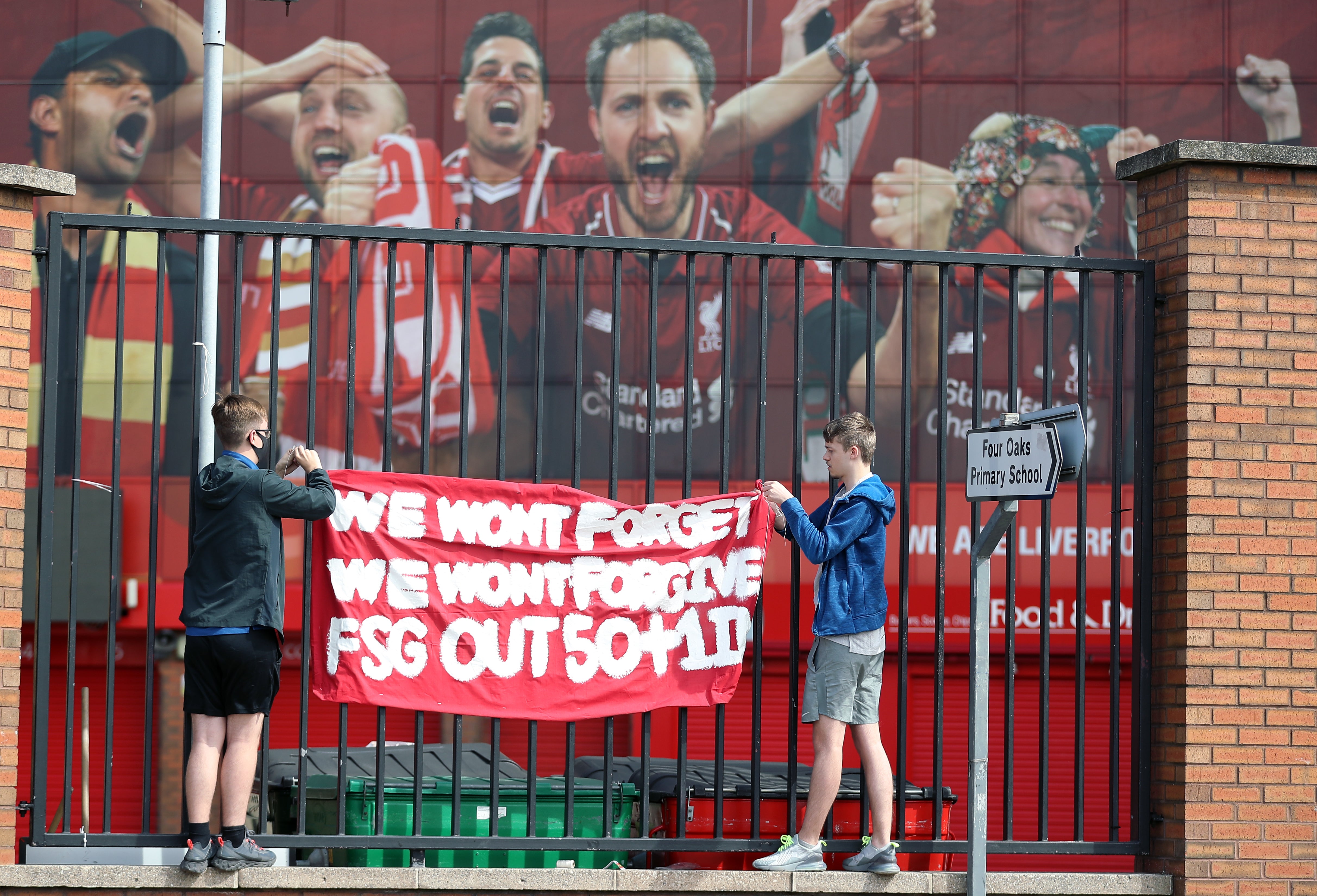 Liverpool fans protest against the clubs owners outside of Anfield