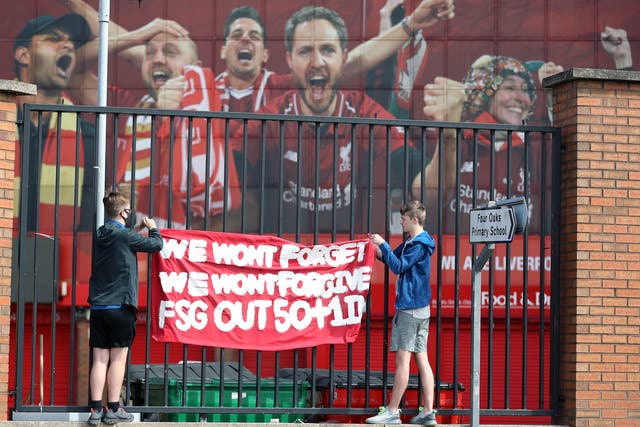 Liverpool fans protest against the clubs owners outside of Anfield