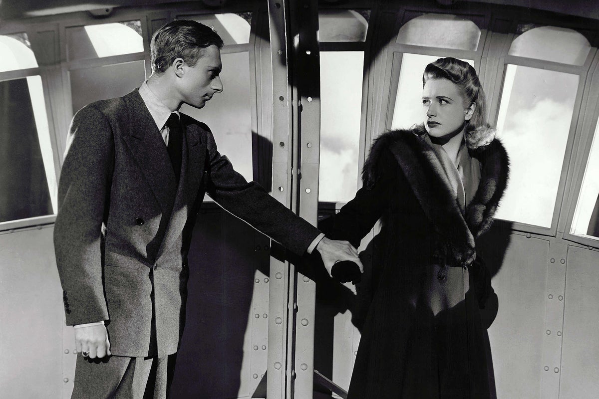 Lloyd as the villainous Frank Fry, with Priscilla Lane (Pat Martin) in the 1942 Hitchcock thriller ‘Saboteur’