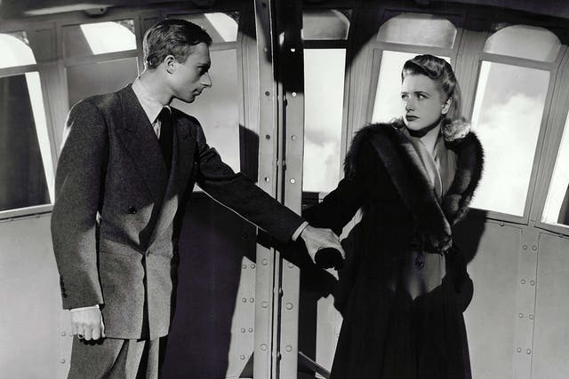 <p>Lloyd as the villainous Frank Fry, with Priscilla Lane (Pat Martin) in the 1942 Hitchcock thriller ‘Saboteur’</p>