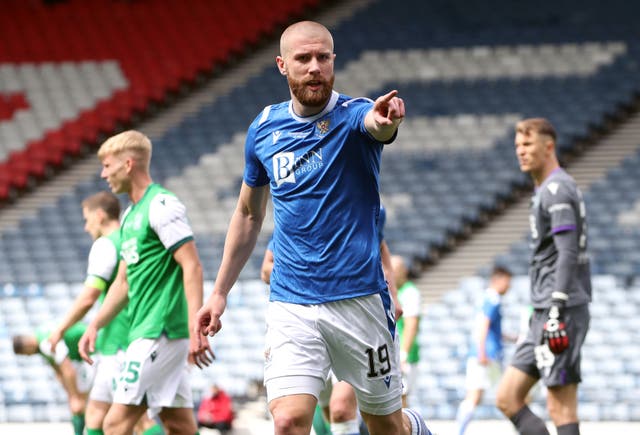 St Johnstone’s Shaun Rooney (centre) scores against Hibernian