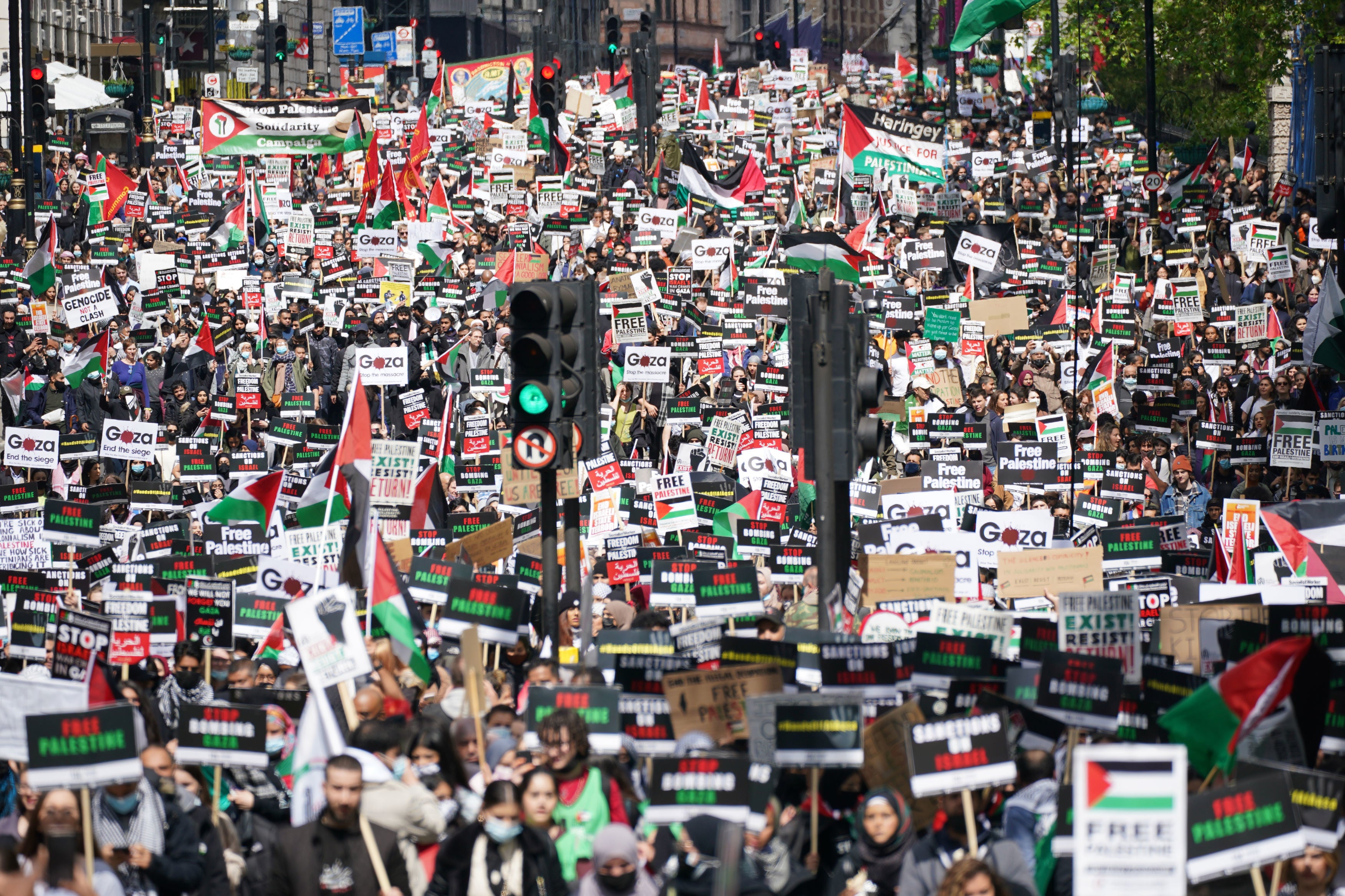 Protesters in Piccadilly in central London, during a march in solidarity with Palestinians