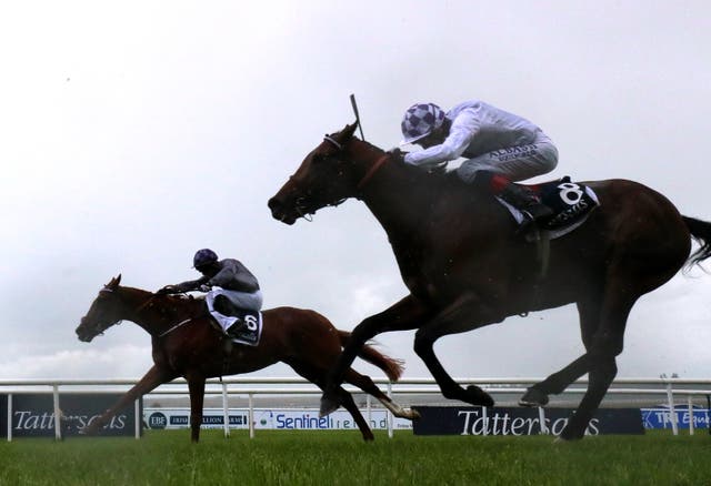 Mac Swiney (left) and Poetic Flare fought out the finish to the Irish 2,000 Guineas