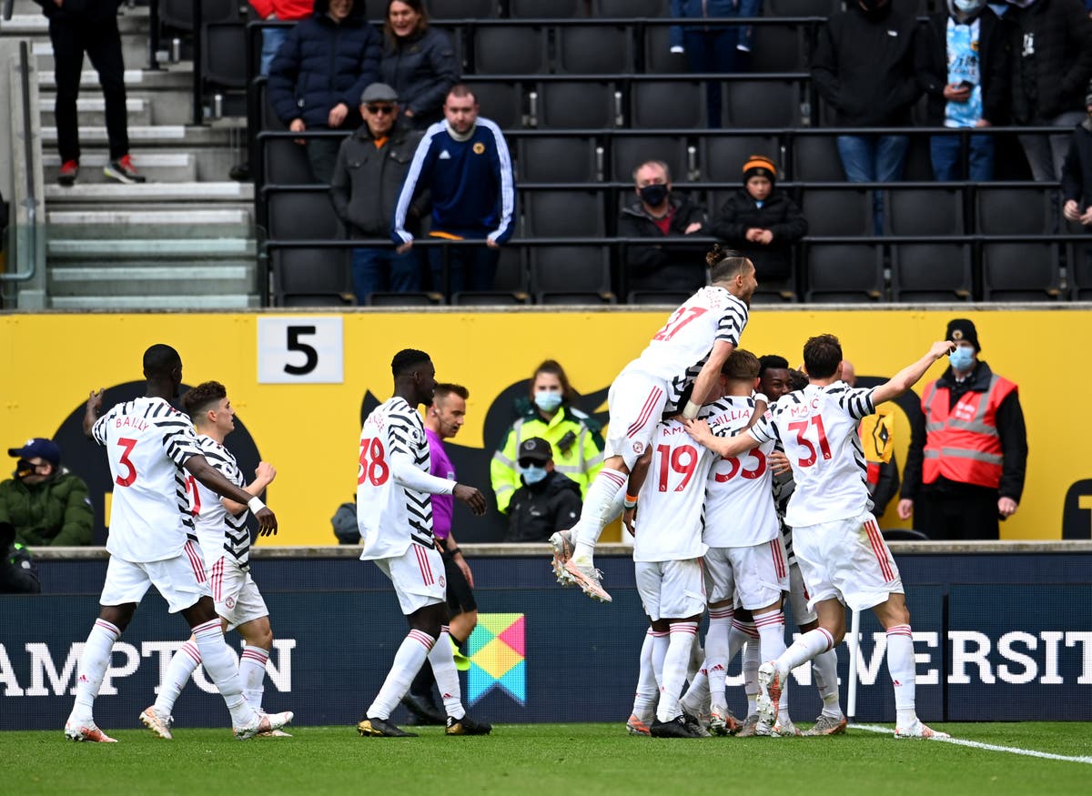 Manchester United complete unbeaten away league campaign with victory at Wolves