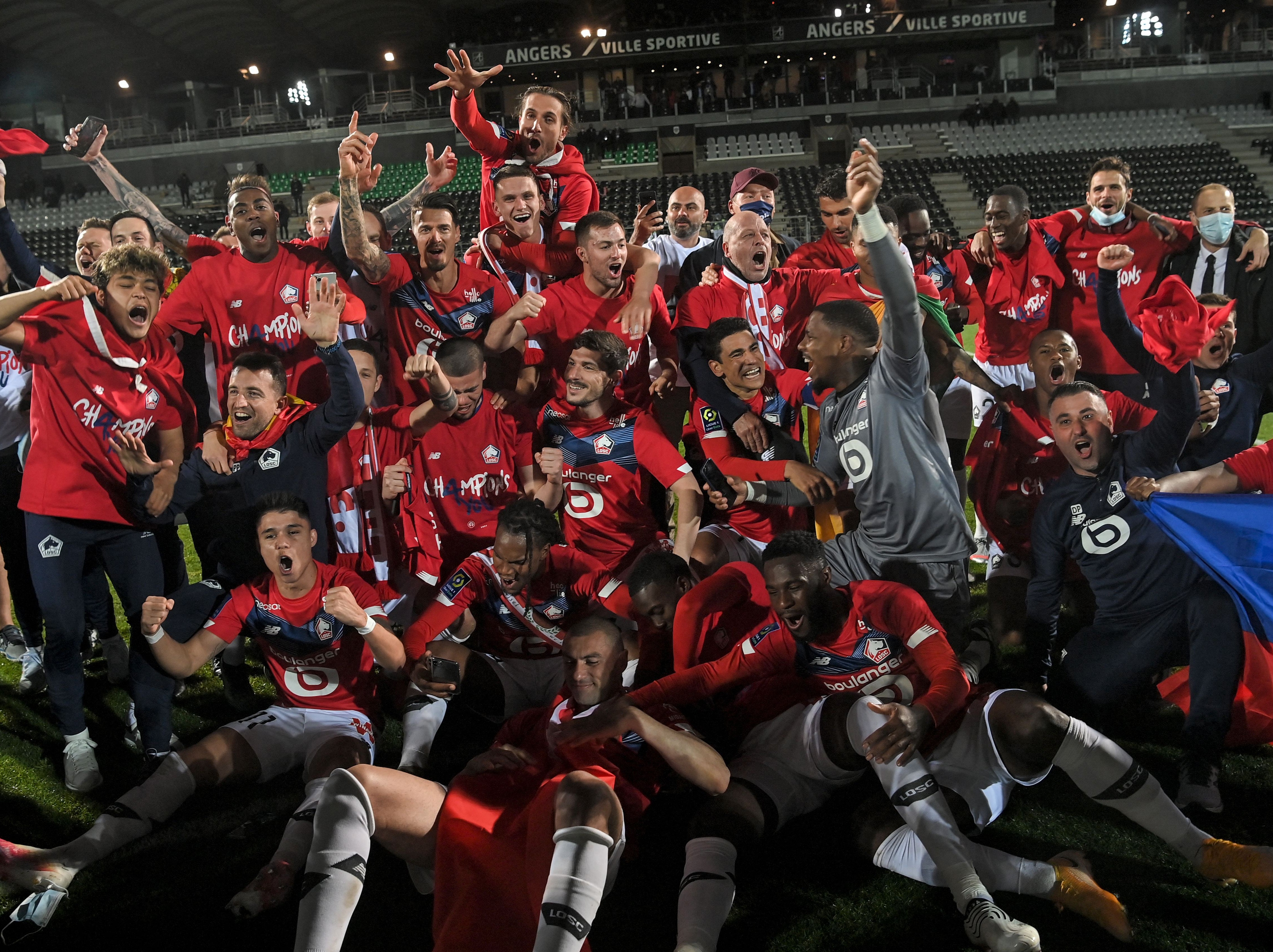 Lille players and staff celebrate their title triumph
