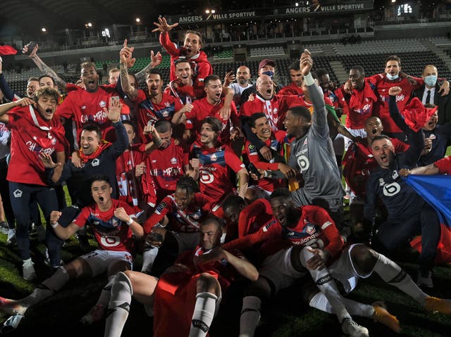 Lille players and staff celebrate their title triumph