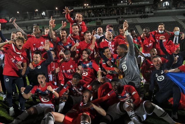 Lille players and staff celebrate their title triumph