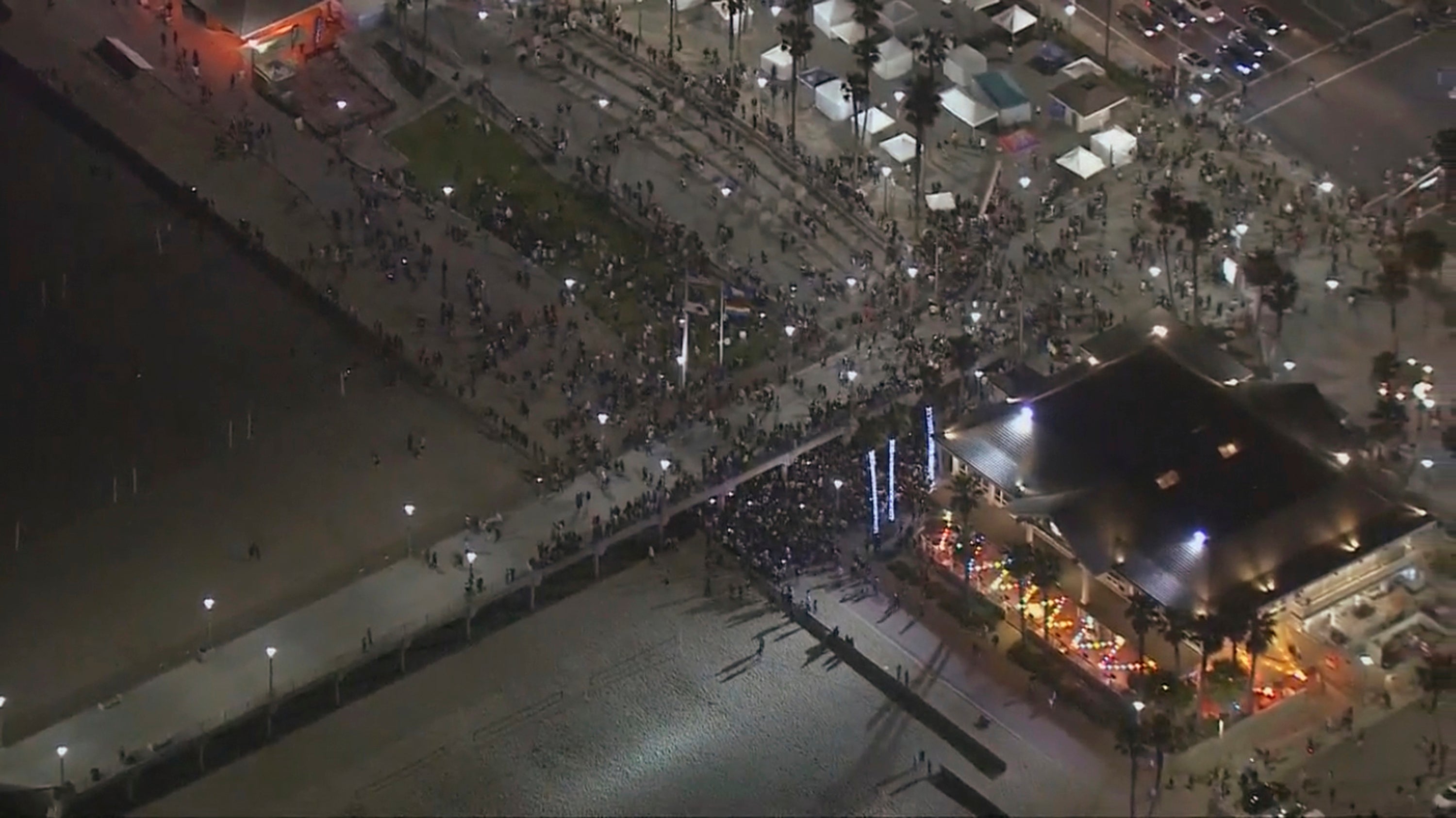 Aerial screenshot on crowd of thousands gathered for TikTok influencer’s birthday party, which led to an overnight ruckus on Saturday