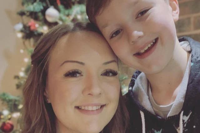 Amy Clarke and her 11-year-old son who remains in a critical condition