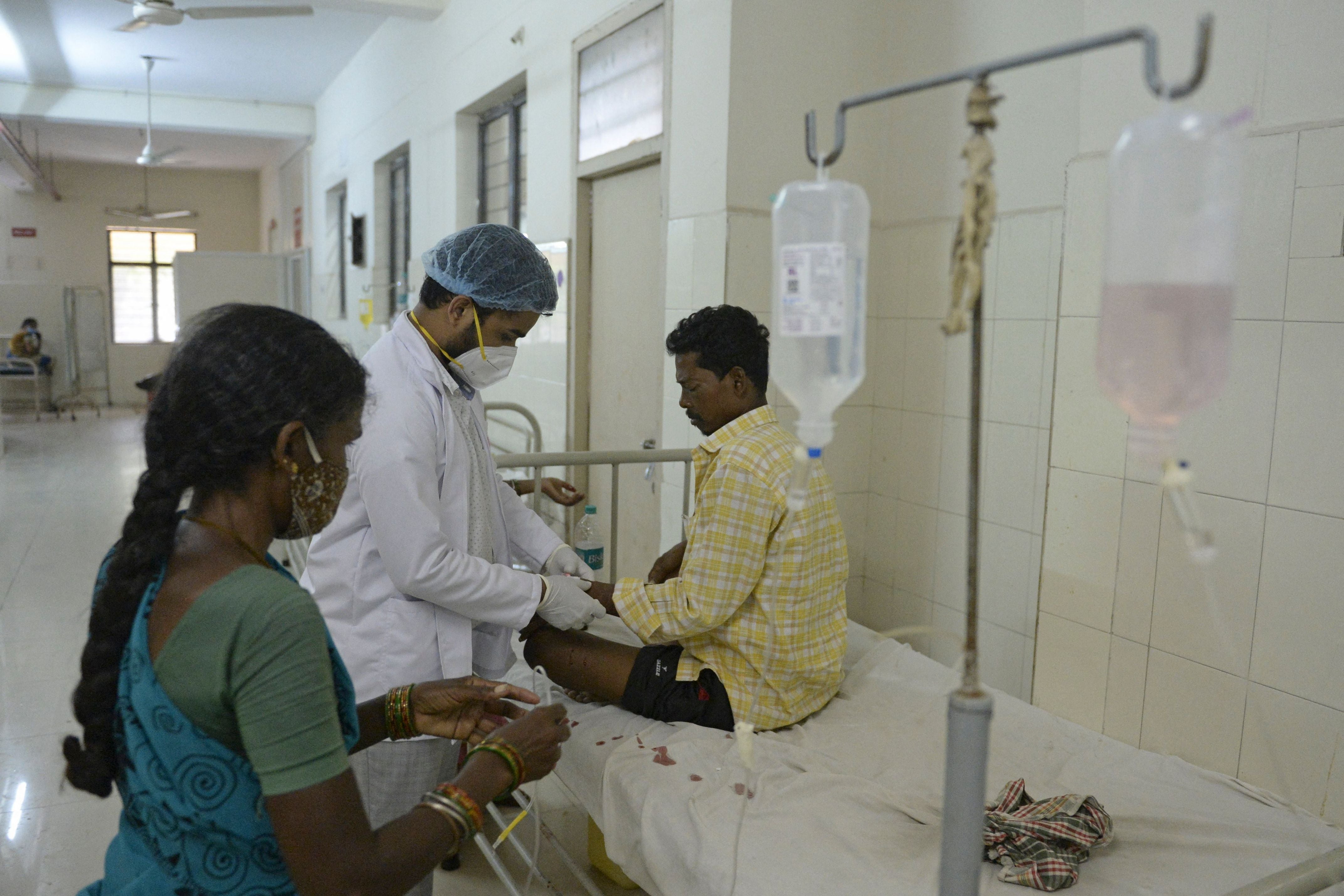 A doctor examines a patient who recovered from Covid-19 and is now infected with black fungus at a hospital in Hyderabad on 21 May, 2021