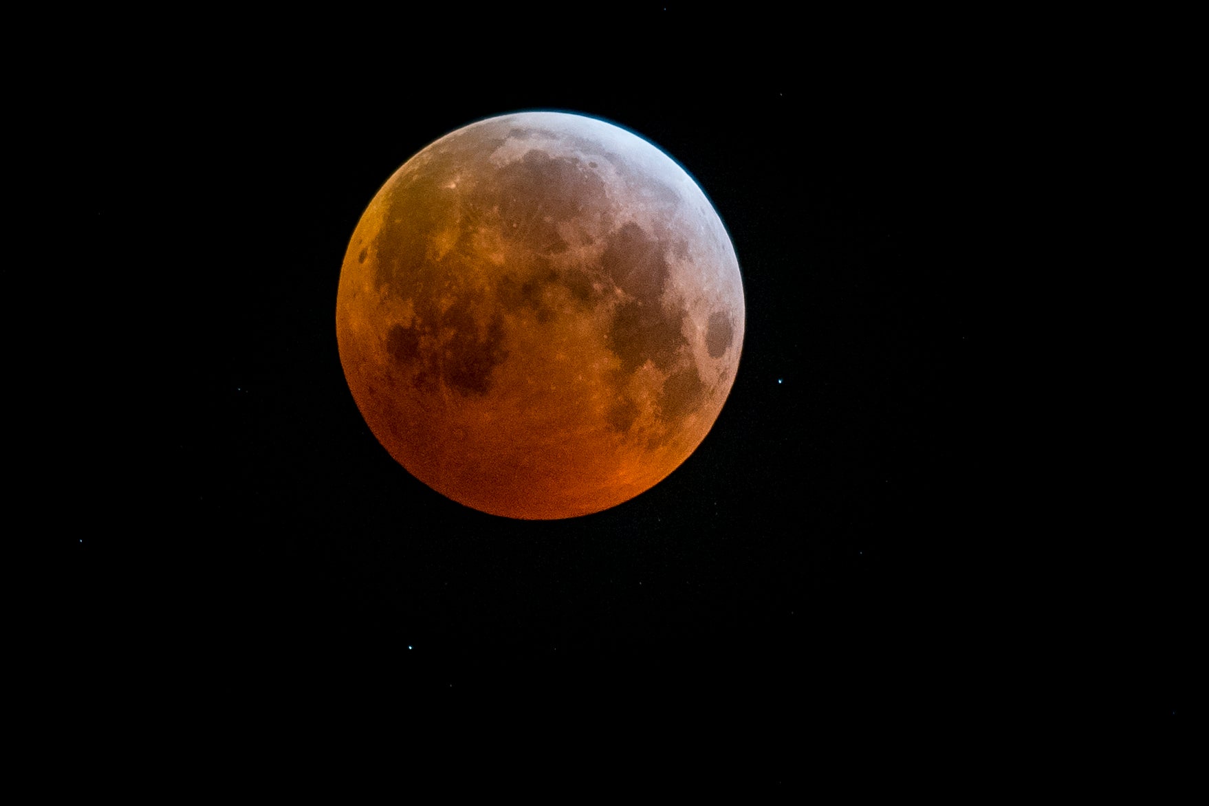 Illustration picture shows a total lunar eclips and bloodmoon over the sky, in Mechelen