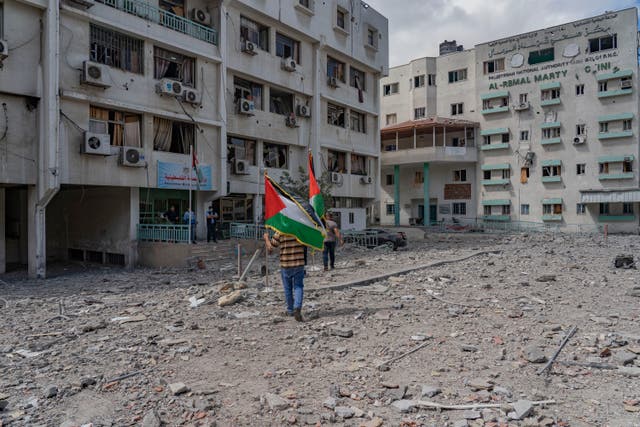 <p>The destroyed remains of a car park outside the ministry of health and PCR testing lab in Gaza</p>