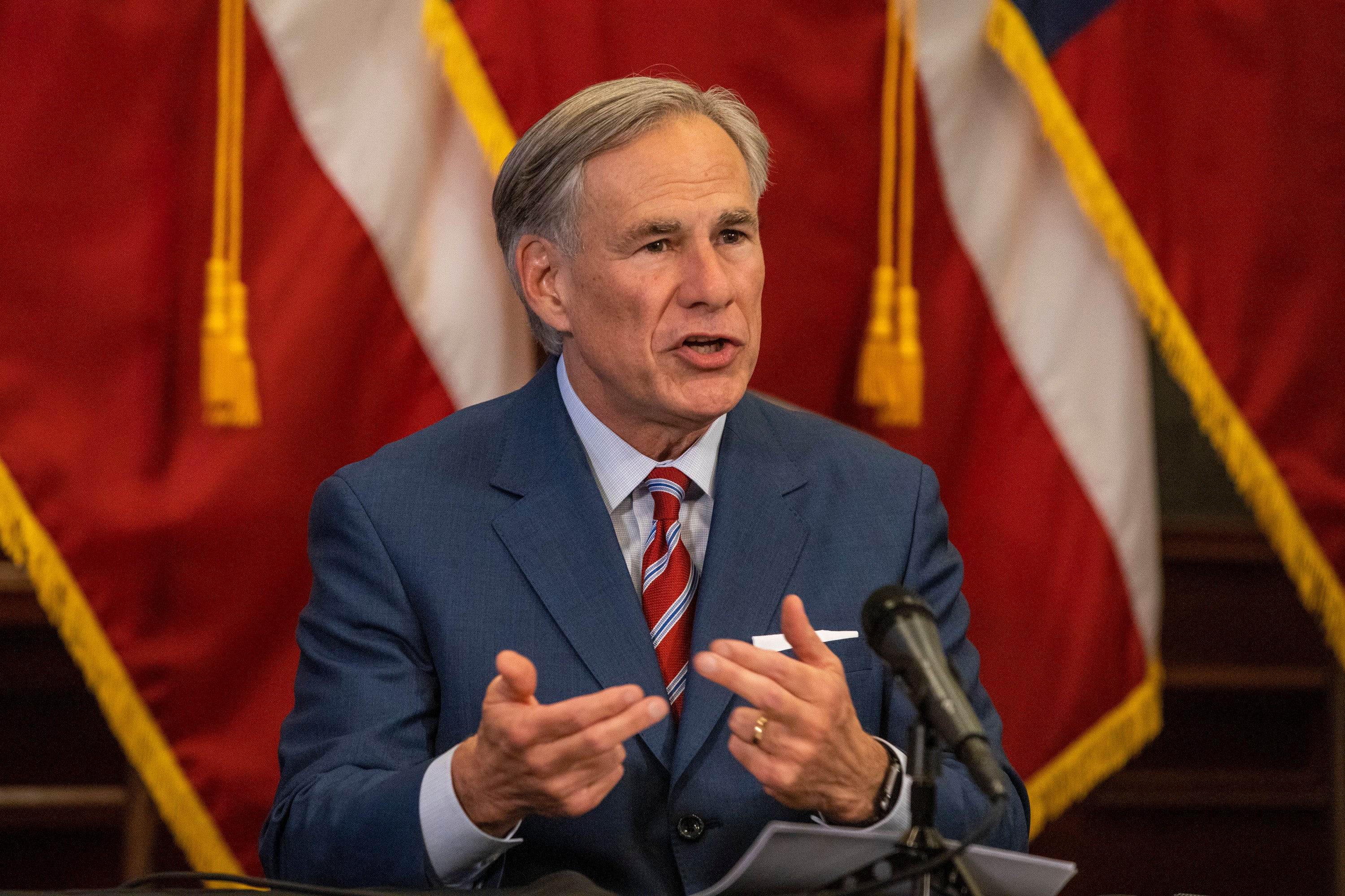 Texas governor Greg Abbott, pictured at a pandemic press conference in May 2020, has vowed to pass a law punishing large cities for defunding the police