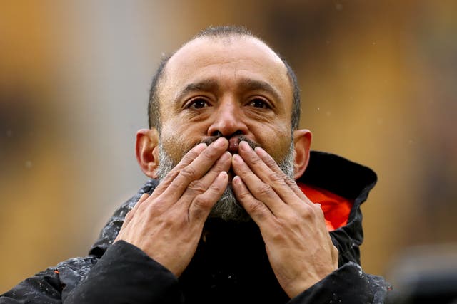 Wolves boss Nuno Espirito Santo blows kisses to the fans after Sunday's 2-1 loss to Manchester United, the final game of his tenure (Bradley Collyer/PA).