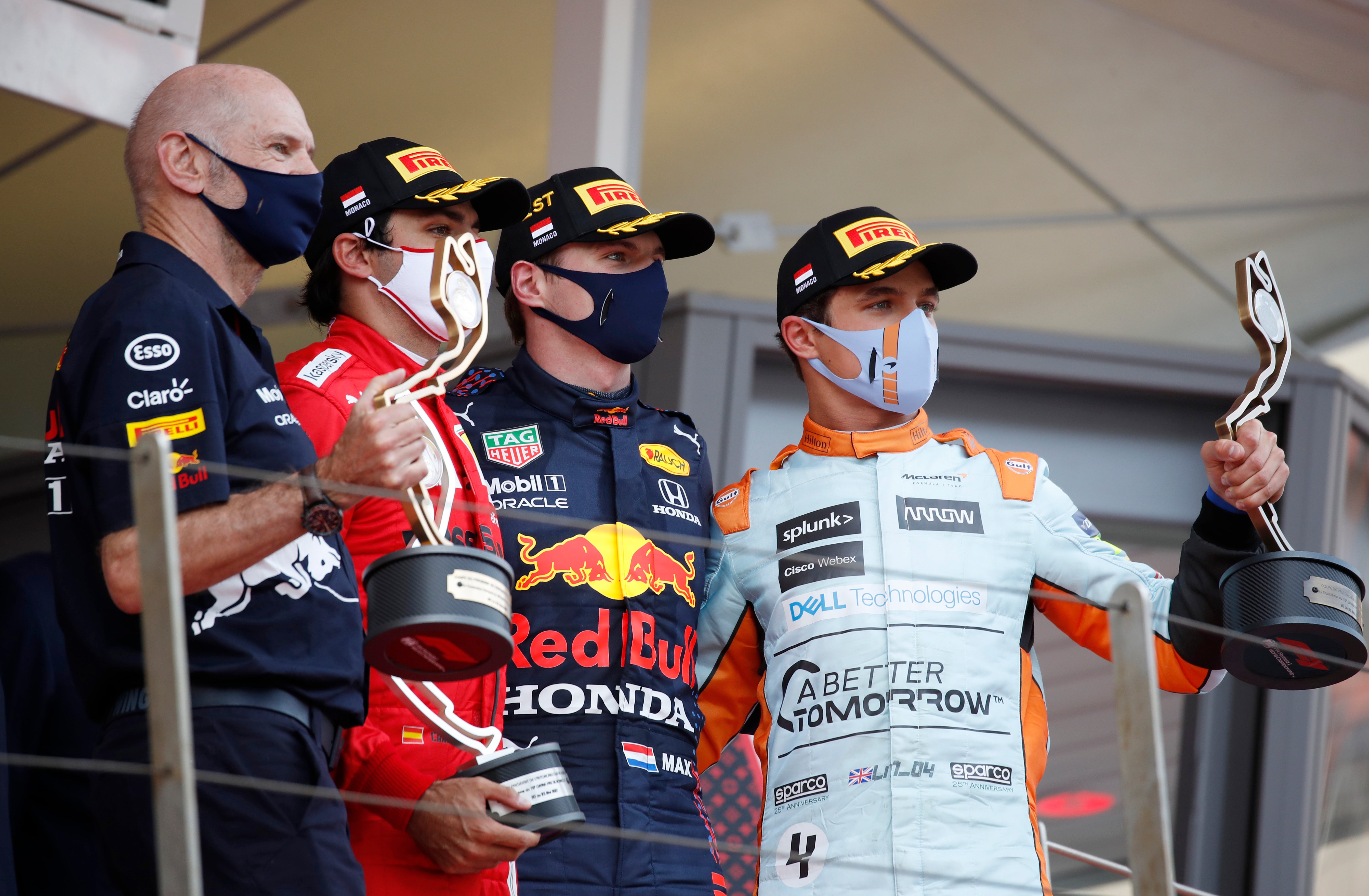 Max Verstappen, Carlos Sainz (second left) and Lando Norris (right) climbed the podium