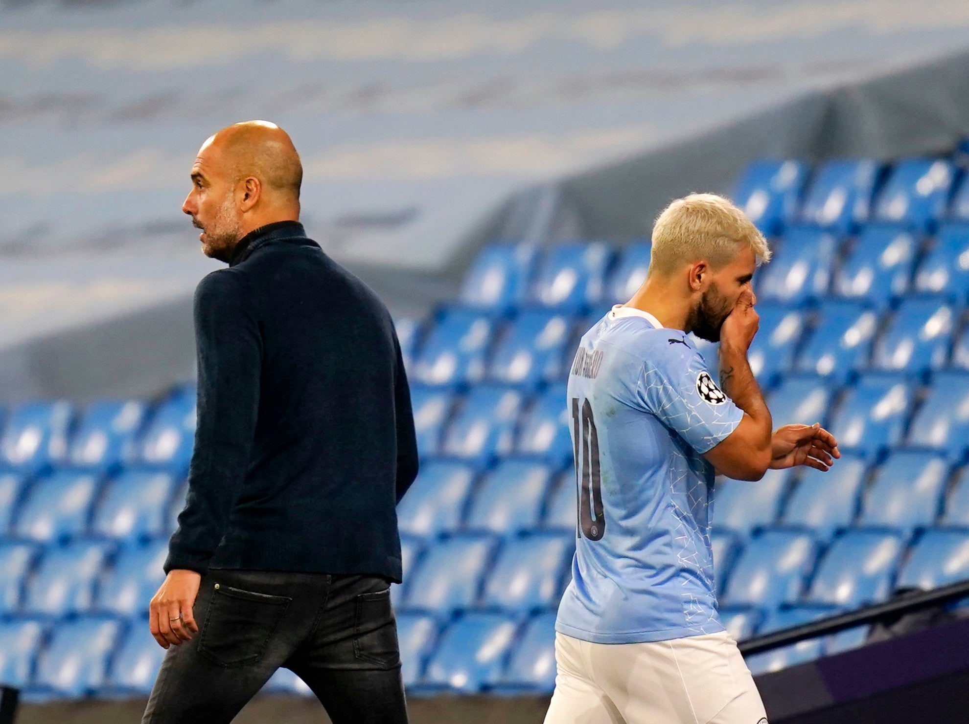 Manchester City coach Pep Guardiola and striker Sergio Aguero