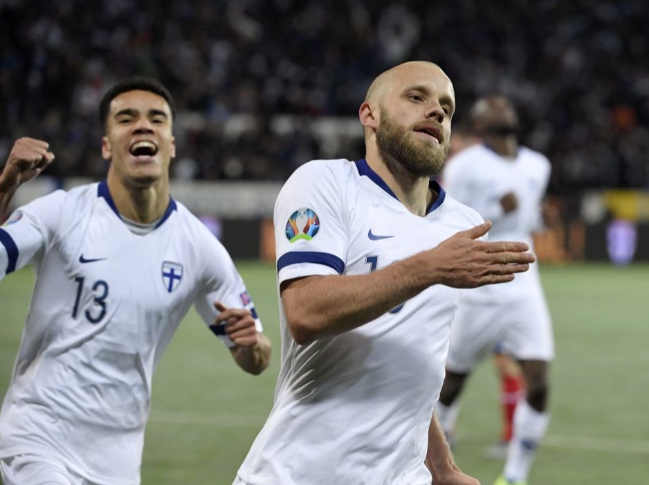 <p>Teemu Pukki celebrates scoring for Finland</p>