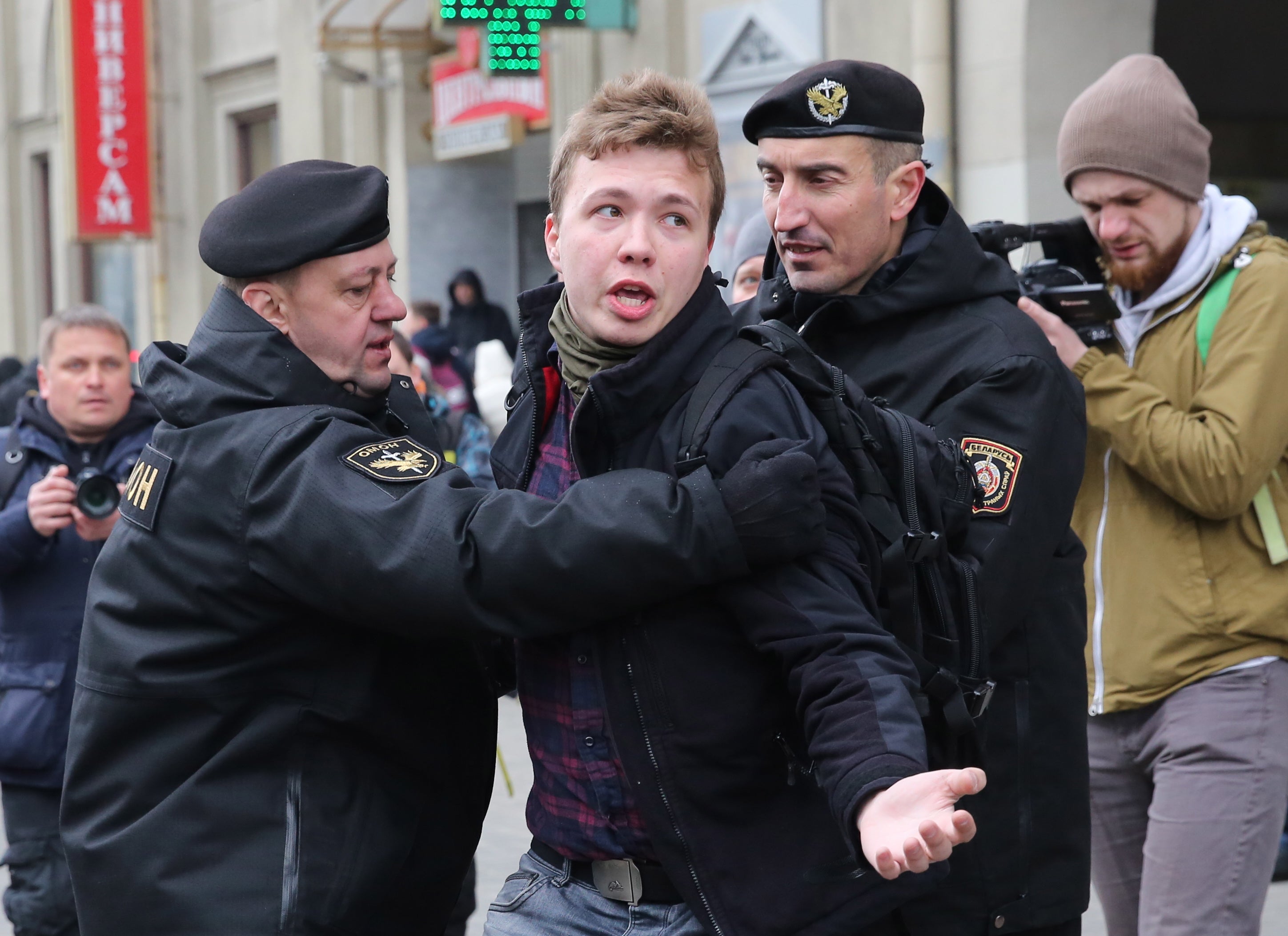 Police officers detain Roman Protasevich attempting to cover a rally in Minsk in March 2017
