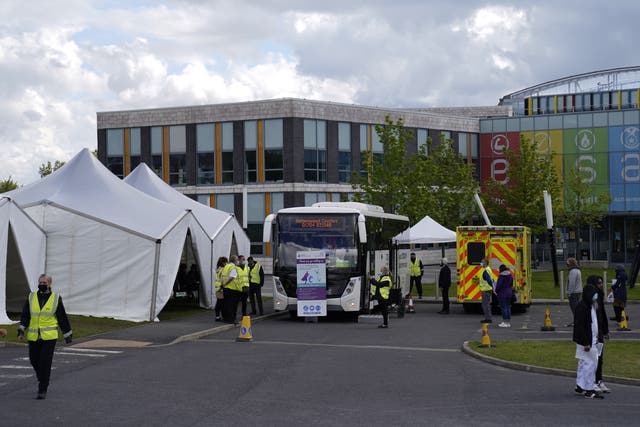 A mobile vaccination centre is pictured at ESSA academy in Bolton, England. 