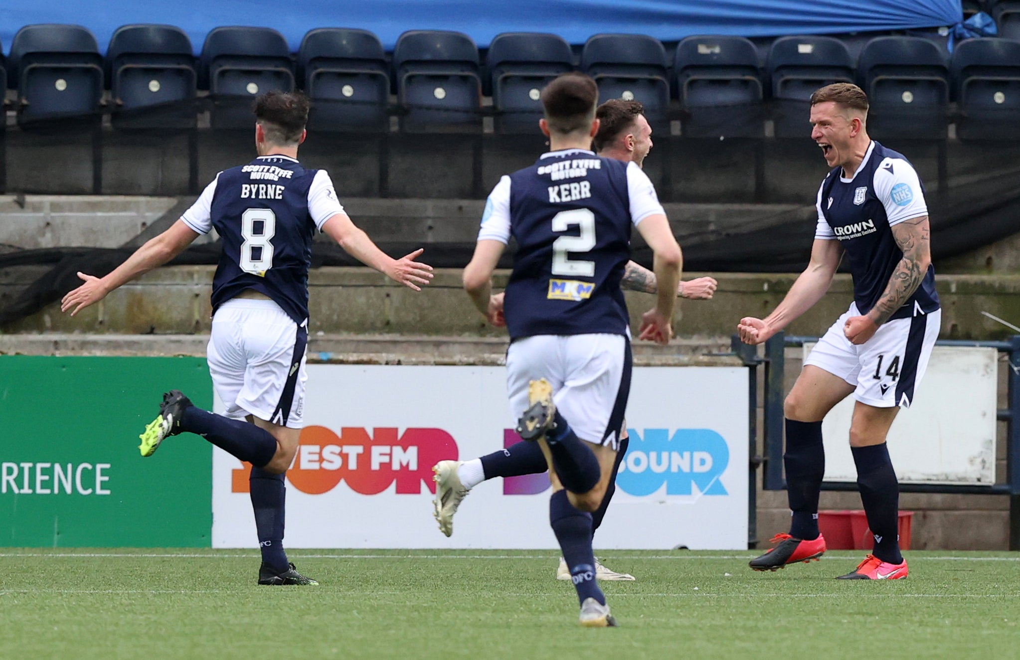 Lee Ashcroft, right, scored as Dundee beat his former club Kilmarnock to win promotion