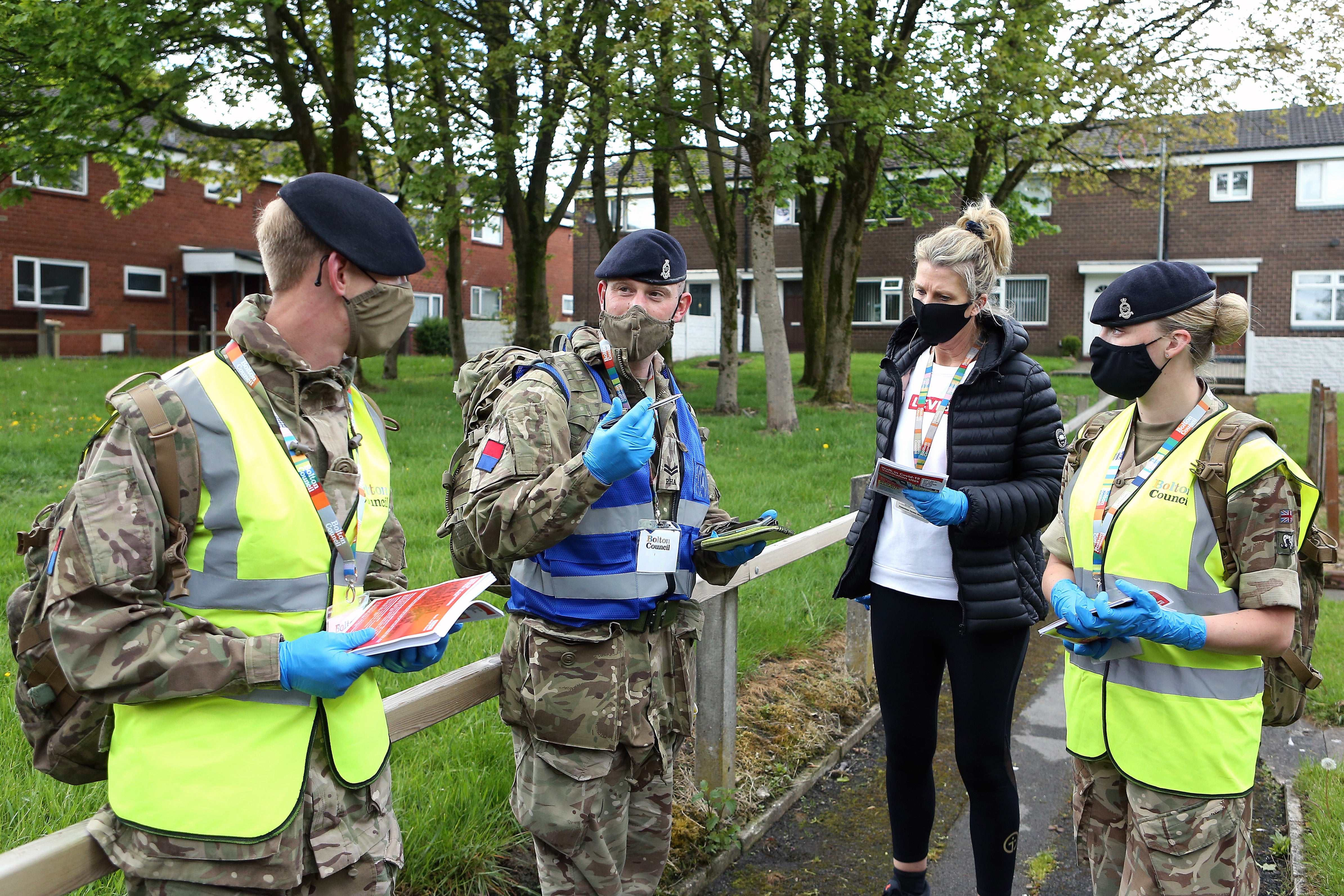 Members of the armed forces help with surge testing in Bolton