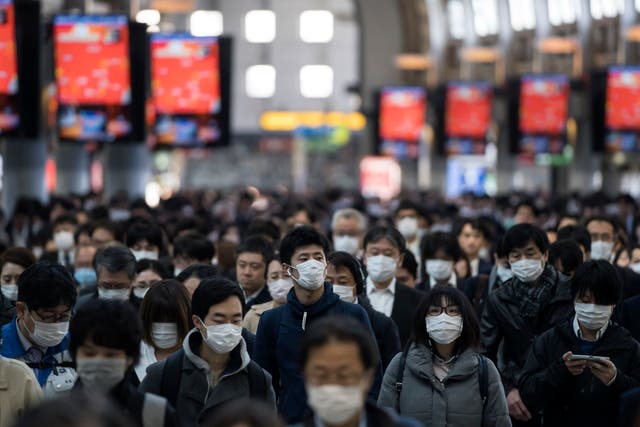 <p>File photo: People make their way to work on 26 March 2020 in Tokyo, Japan. - A senior aide to prime minister Fumio Kishida said in an interview that ‘if we go on like this, the country will disappear’</p>