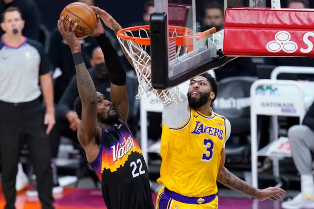 Phoenix Suns centre Deandre Ayton dunks against Los Angeles Lakers forward Anthony Davis