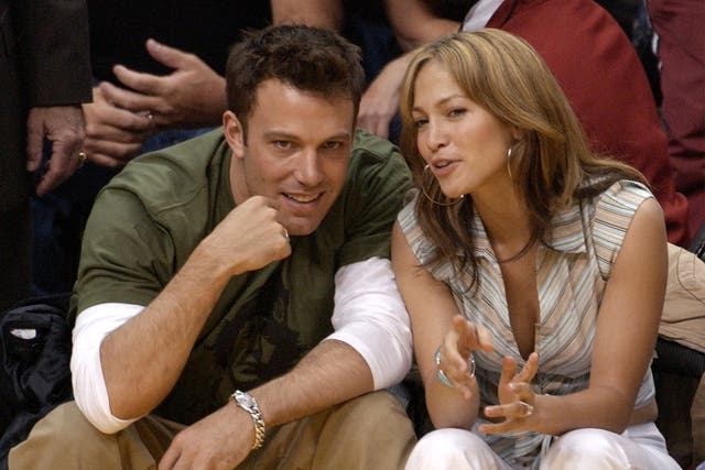 Ben Affleck and Jennifer Lopez attend a Los Angeles Lakers game in 2003