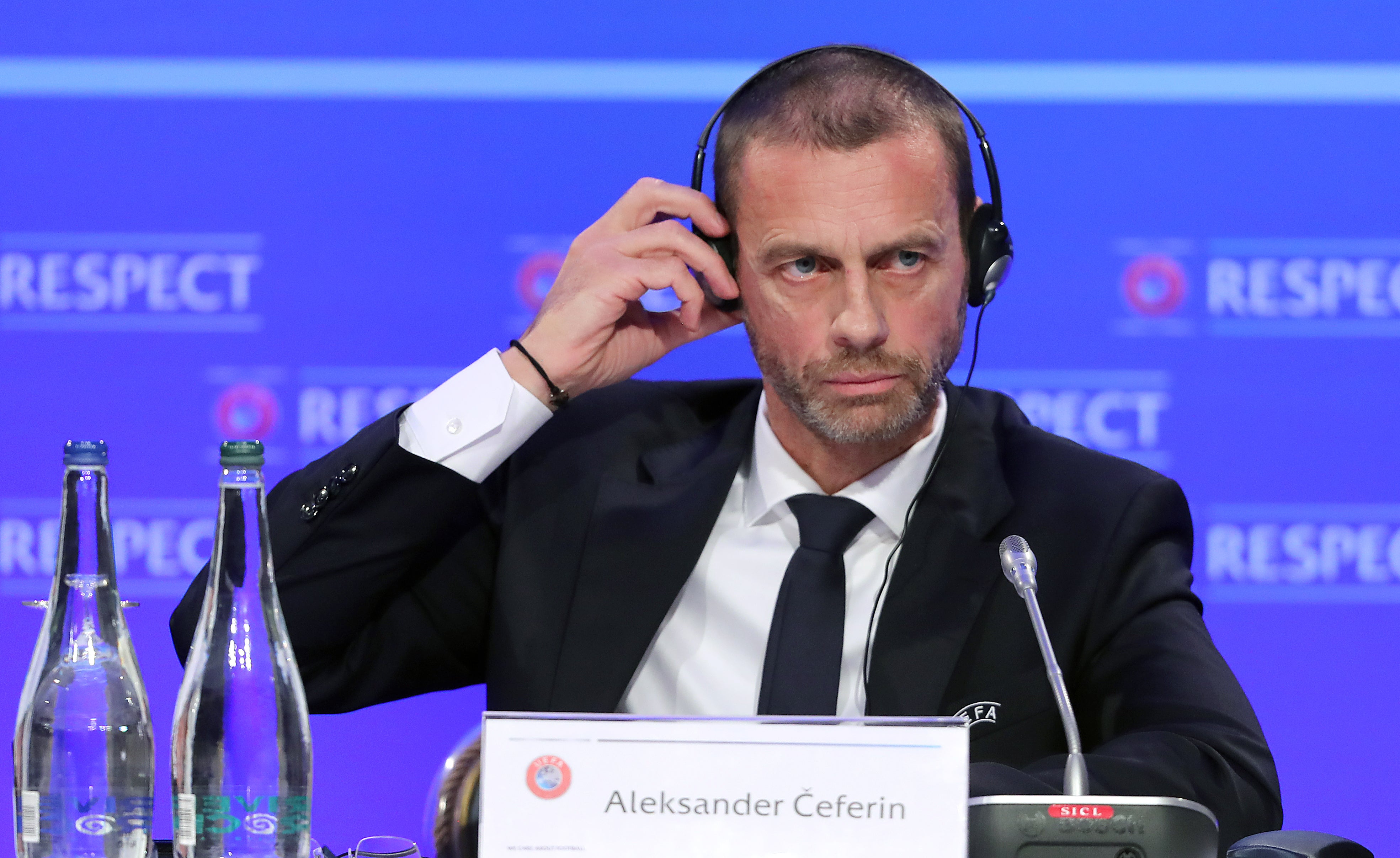 UEFA and its president Aleksander Ceferin have been labelled "greedy" by Chelsea and Manchester City supporters