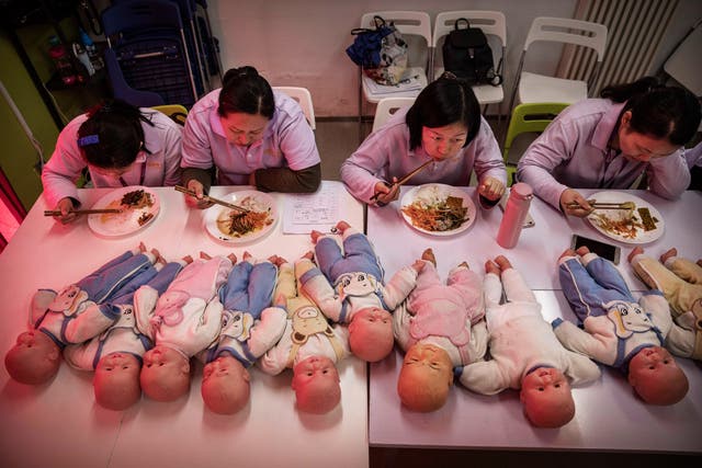 <p>Women in China training to be  nannies in Beijing in 2016 </p>
