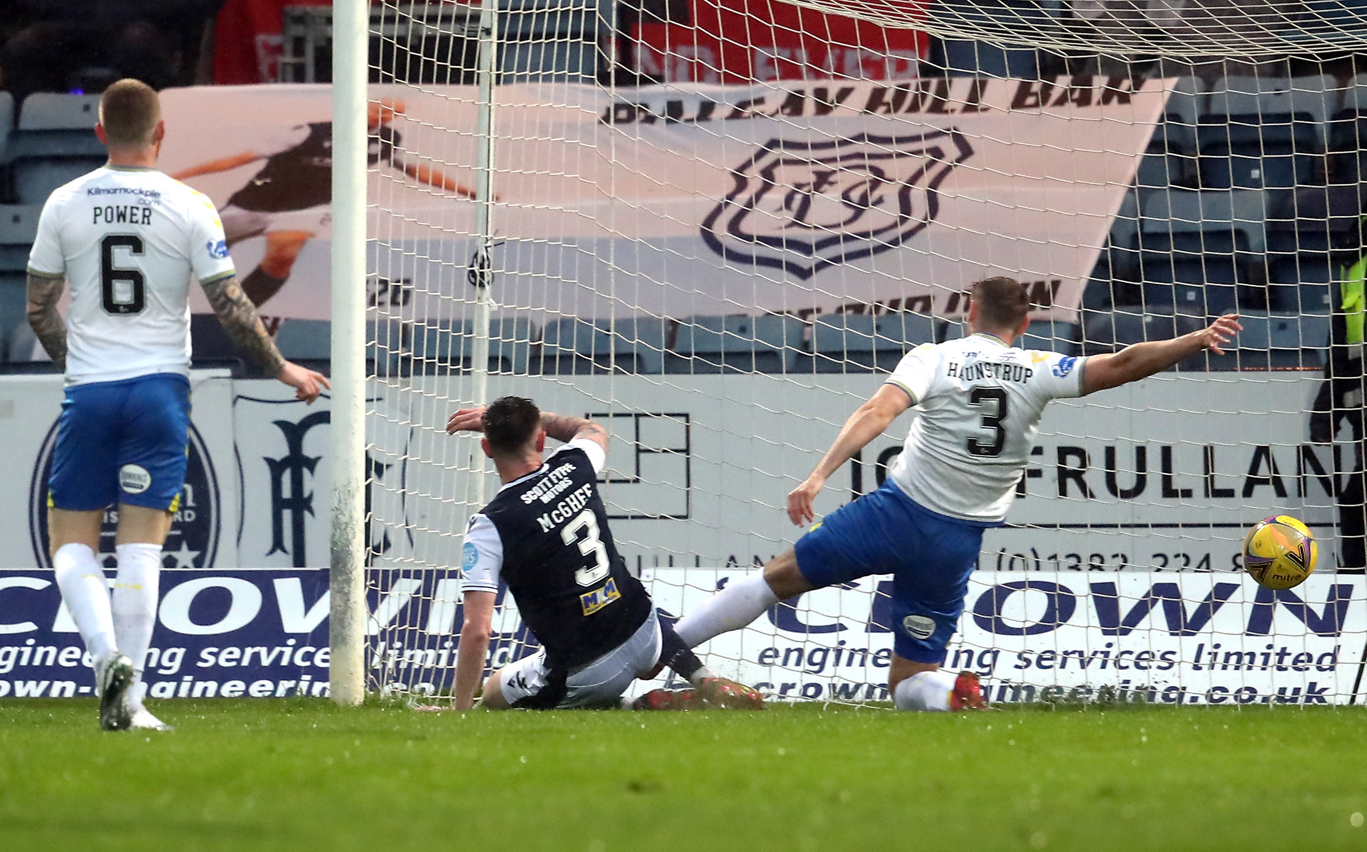 Jordan McGhee (centre) netted in Dundee's play-off win over Kilmarnock