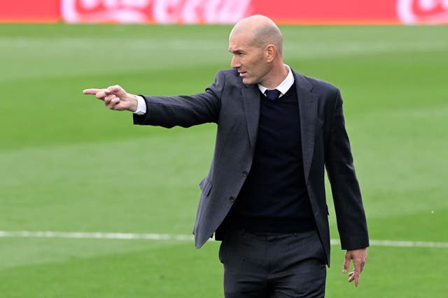 Zinedine Zidane gestures from the touchline