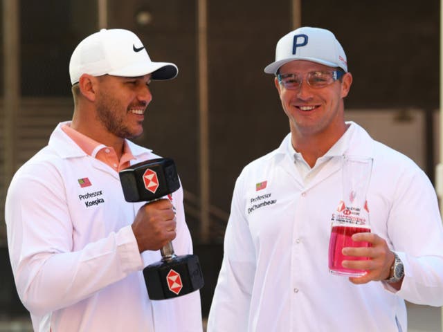 <p>Brooks Koepka and Bryson DeChambeau pose at the Abu Dhabi HSBC Championship</p>