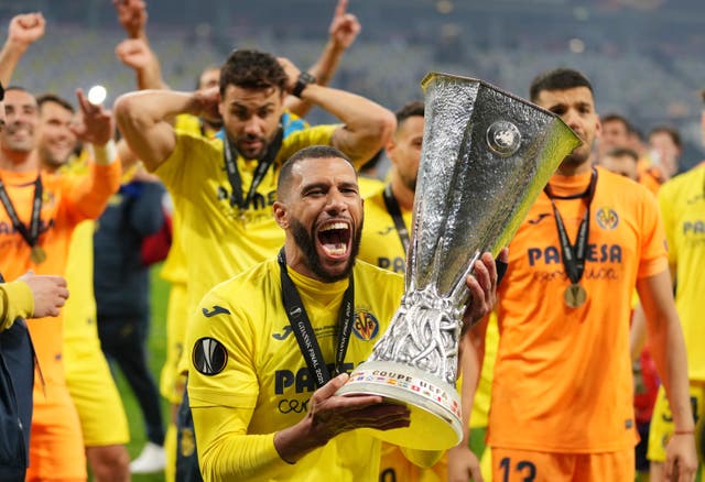 Villareal’s Etienne Capoue holds the Europa League trophy