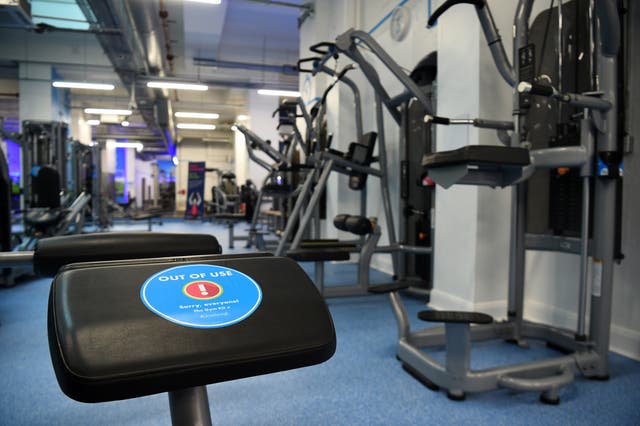 An 'out of use’ marker on an exercise machine inside the Gym Group in Vauxhall, London