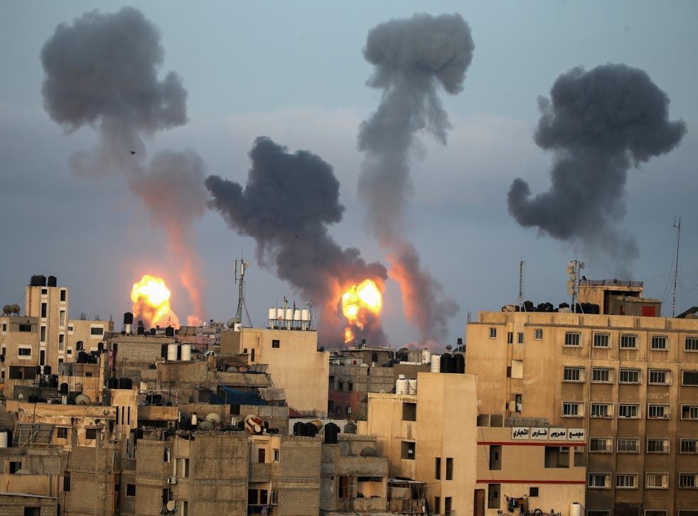 Flames and smoke rise during Israeli air strikes in Gaza