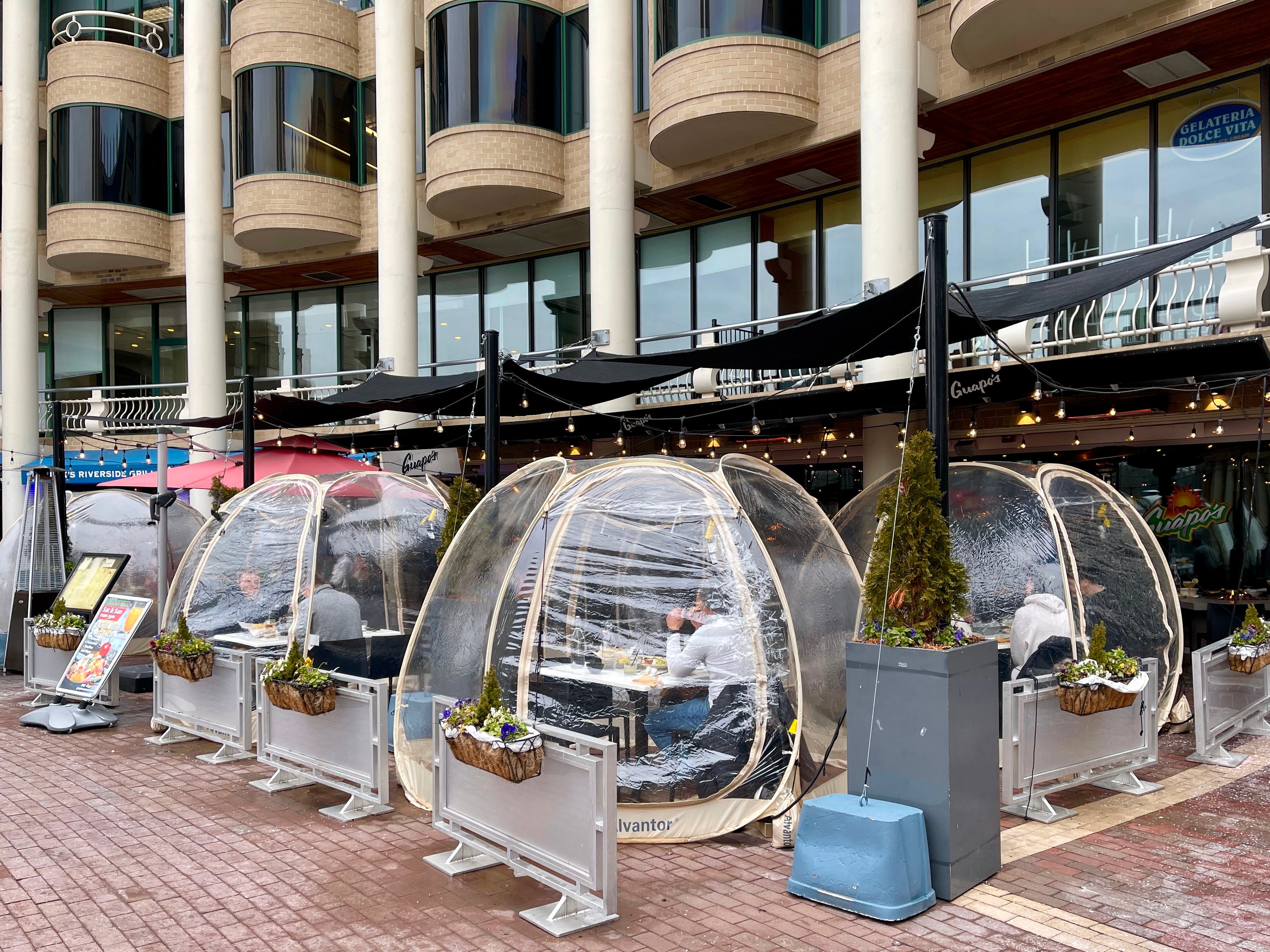 Coronavirus outbreak in the US has prompted restaurants owners to innovate enclose plastic domes dining areas