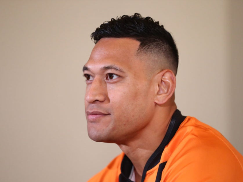 Israel Folau speaks to media at a press conference