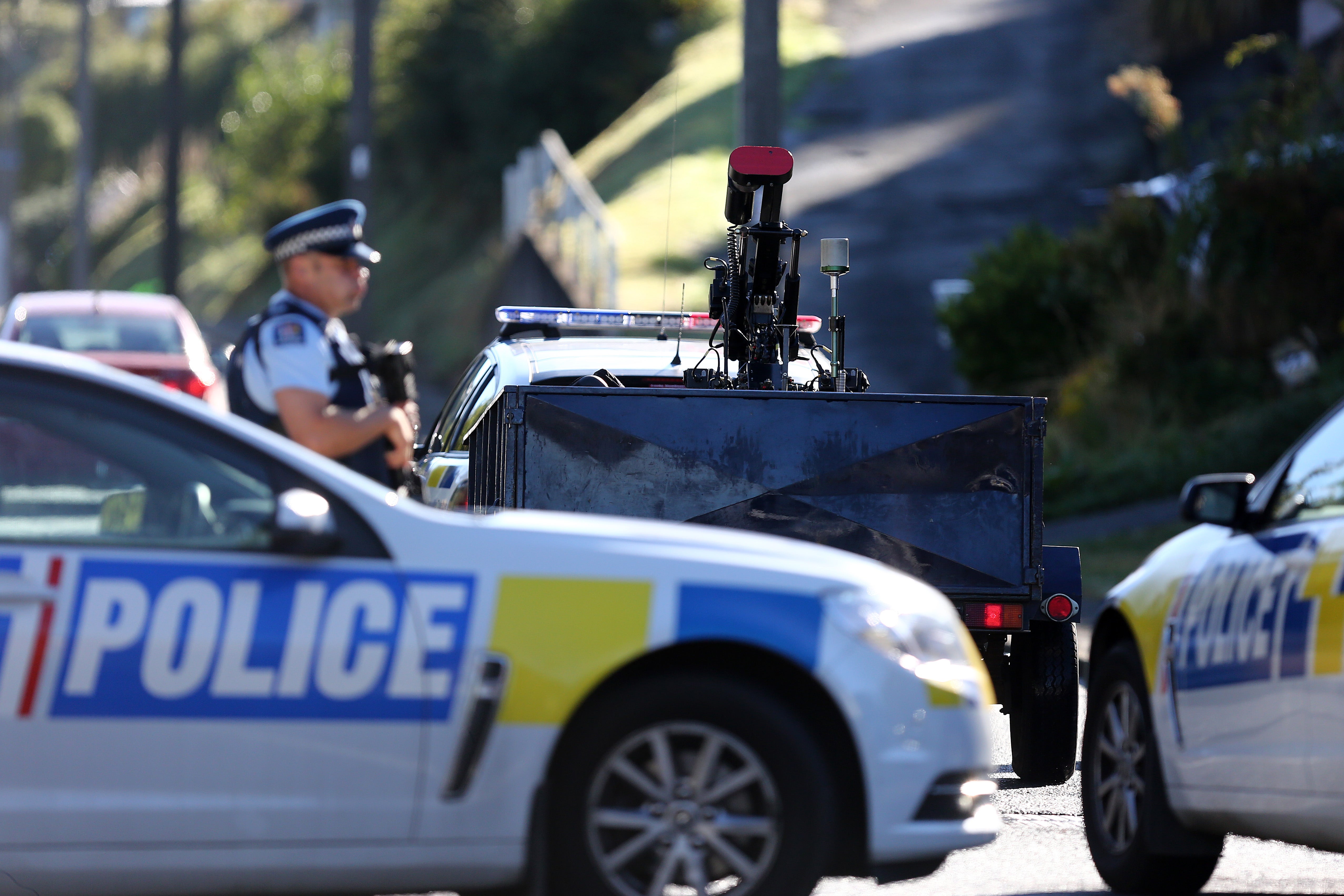 Police investigate a property in Dunedin, New Zealand on 16 March, 2019.