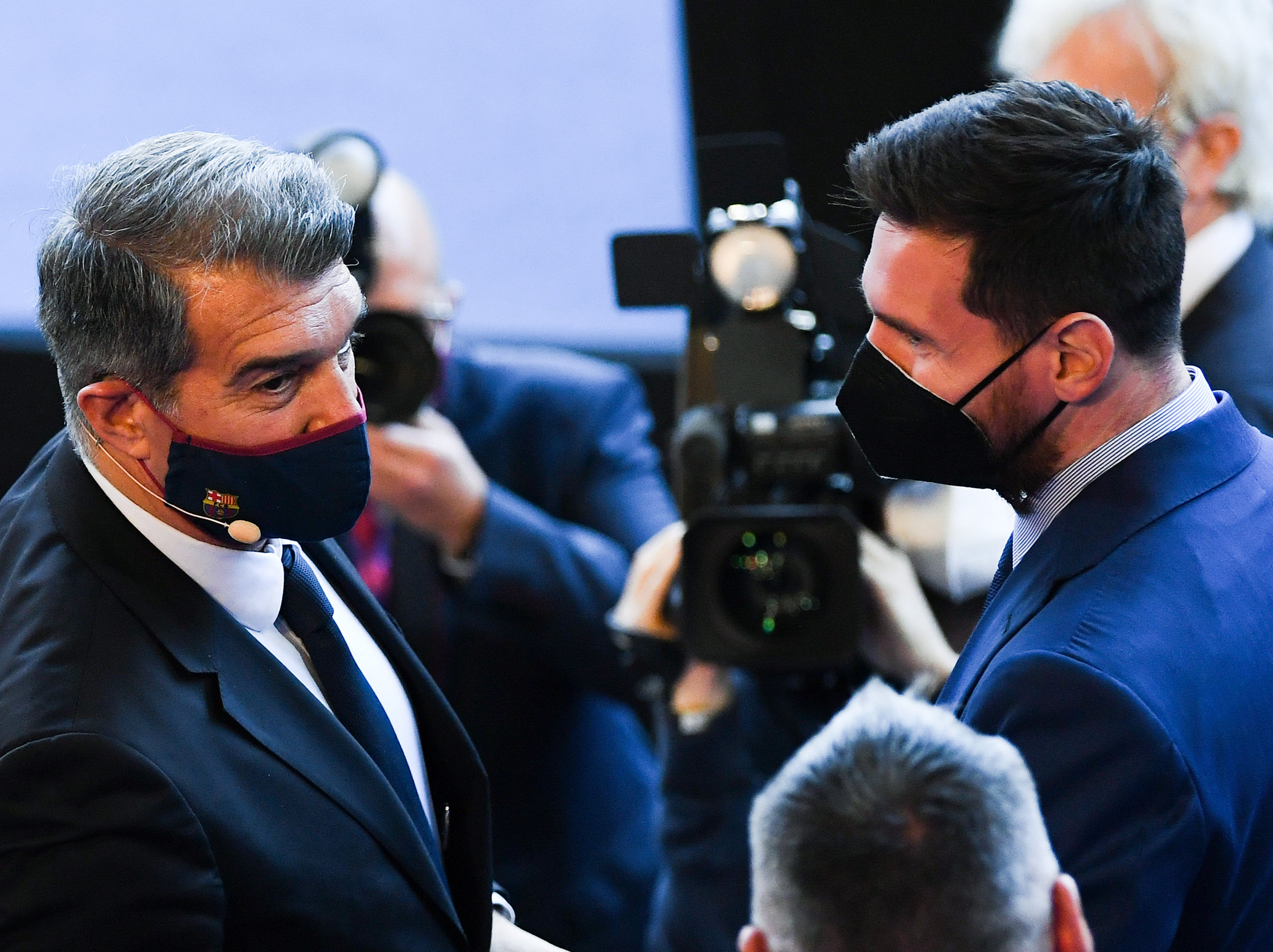 Barca president Joan Laporta with Lionel Messi