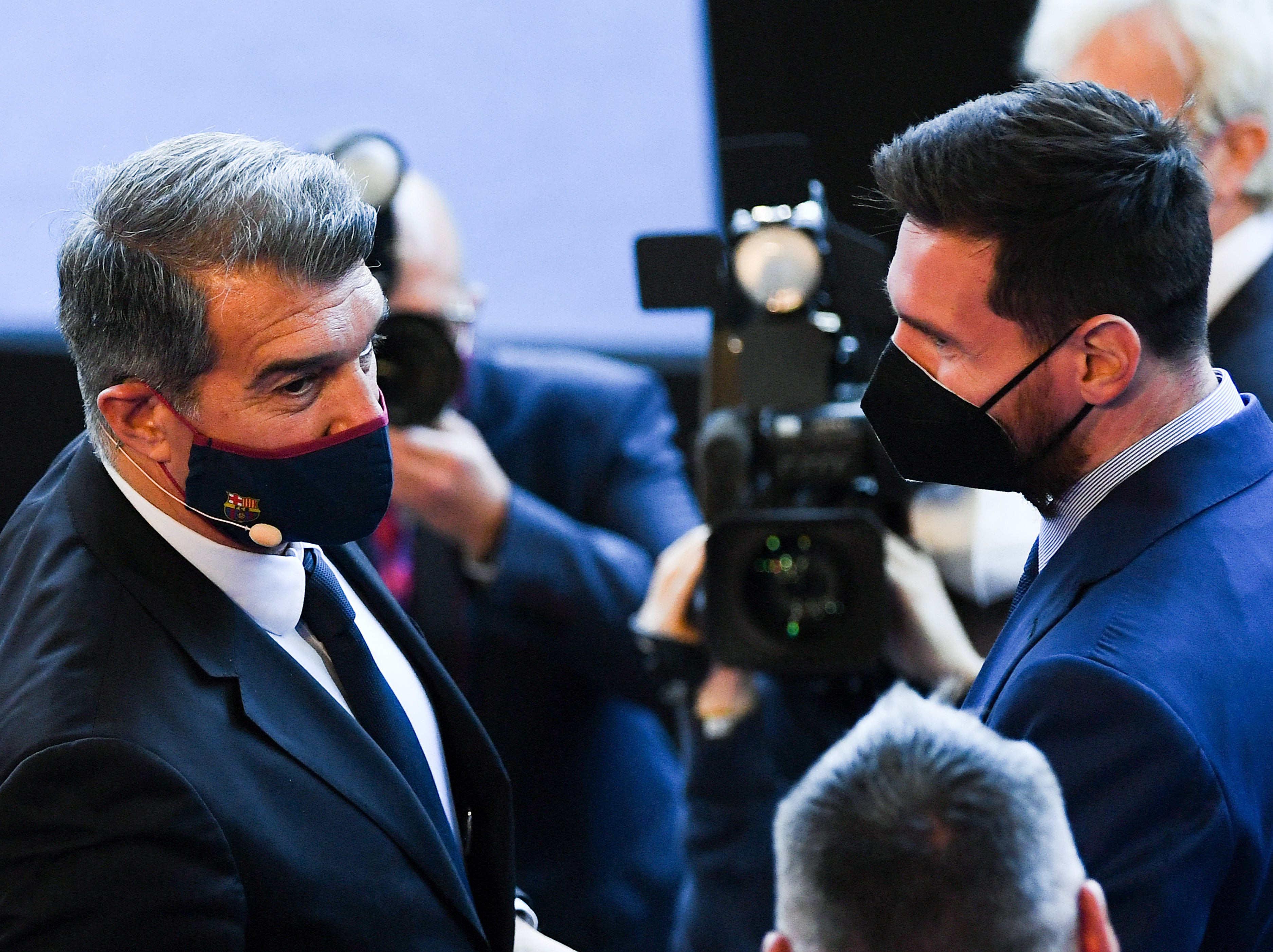 Barcelona club president Joan Laporta (left) with Lionel Messi