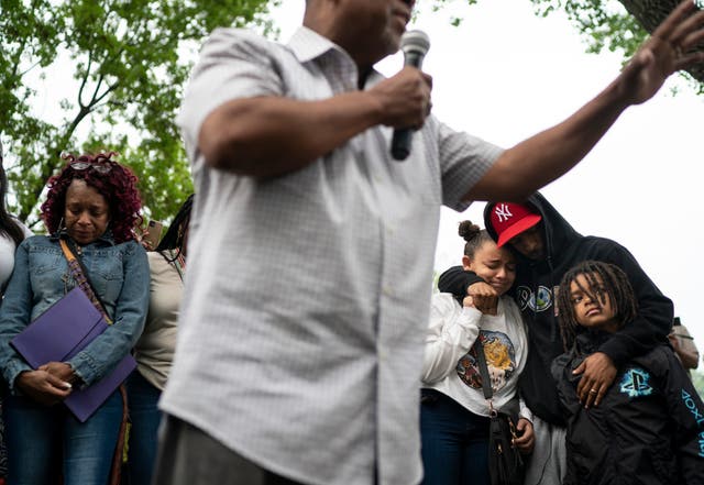 <p>Pastor Brian Herron prays for the families of Trinity Ottoson-Smith and Ladavionne Garrett Jr. during a prayer vigil at North Memorial hospital after three children were shot in the last week in Minneapolis, Tuesday, May 18, 2021. </p>