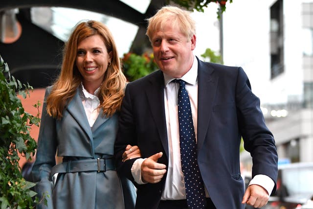 <p>Boris Johnson, right, with his wife Carrie Johnson</p>