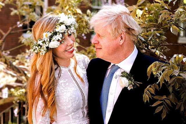 <p>Boris Johnson and Carrie Johnson in the garden of 10 Downing Street after their wedding on Saturday</p>