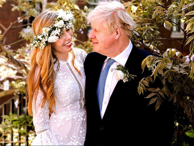 <p>Prime Minister Boris Johnson and Carrie Johnson in the garden of 10 Downing Street after their wedding on Saturday</p>
