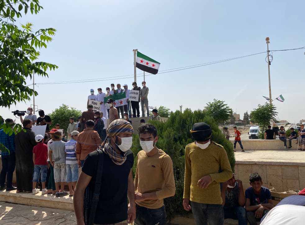 <p>Syrians in Tal Abyad protest against a weeks-long lack of electricity and water</p>