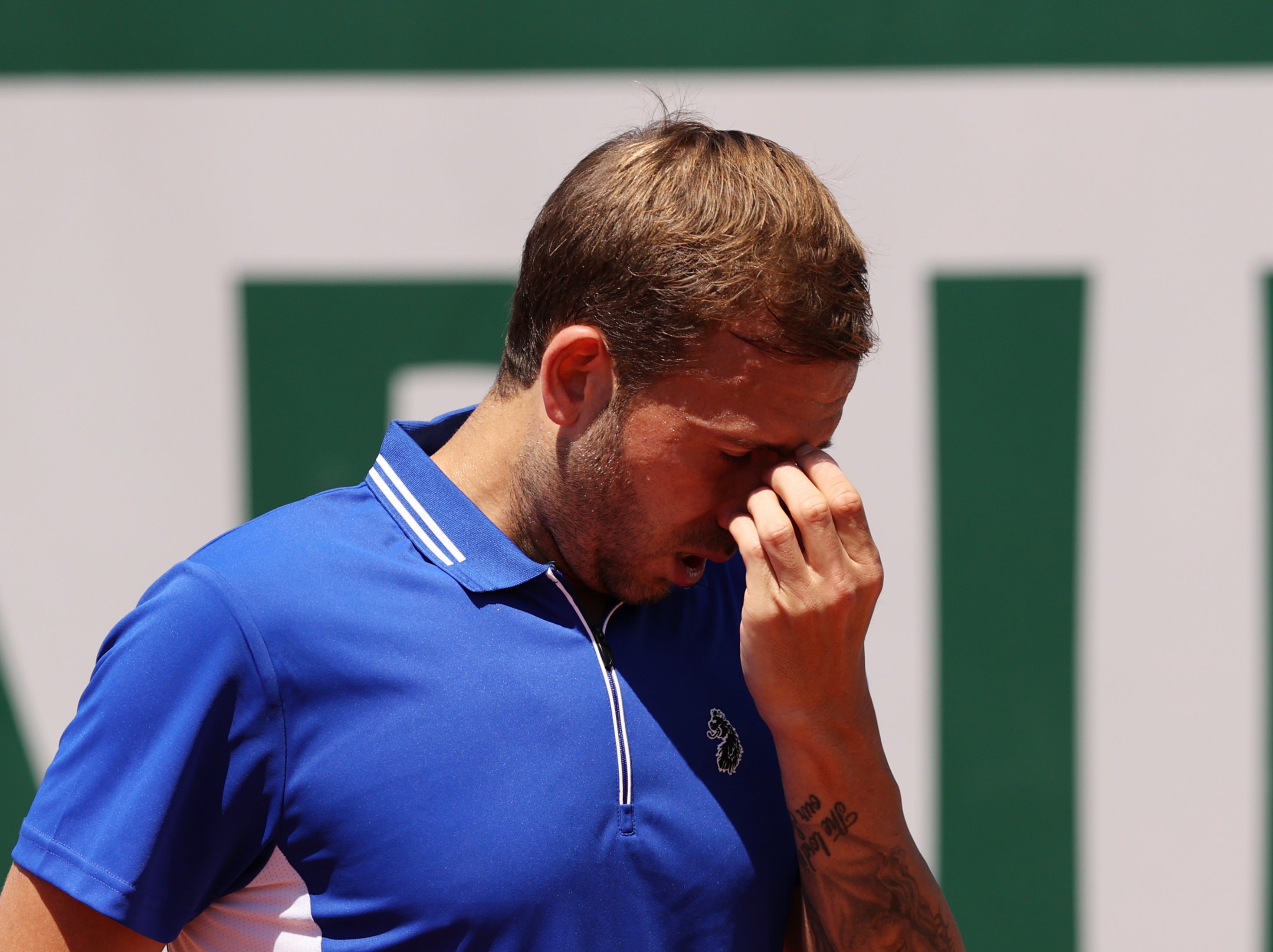 Dan Evans reacts to his loss against 21-year-old Miomir Kecmanovic